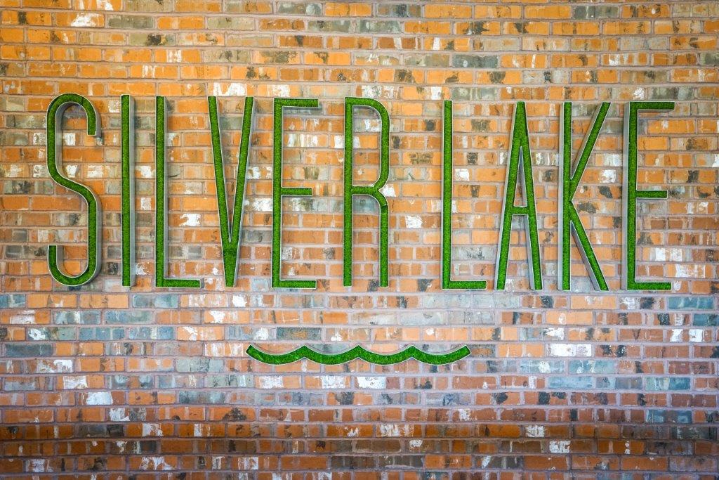 Silver Lake signage on brick.