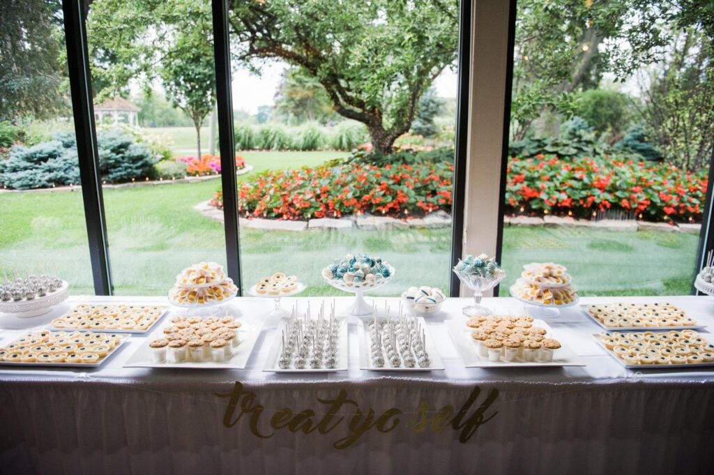 Sunlit table displaying hors d'oeuvre.